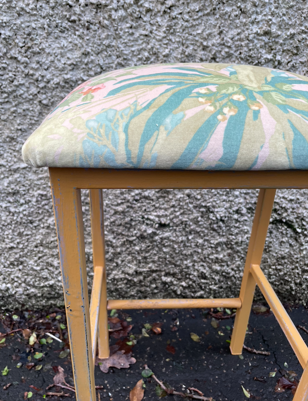 Vintage metal stool with tropical velvet seat pad