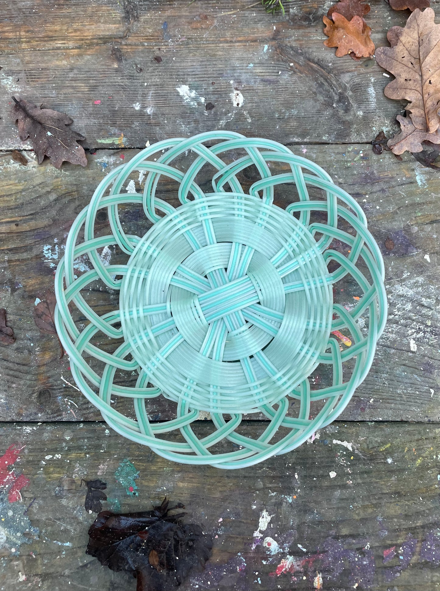 plastic woven bowl in pastel mint greens