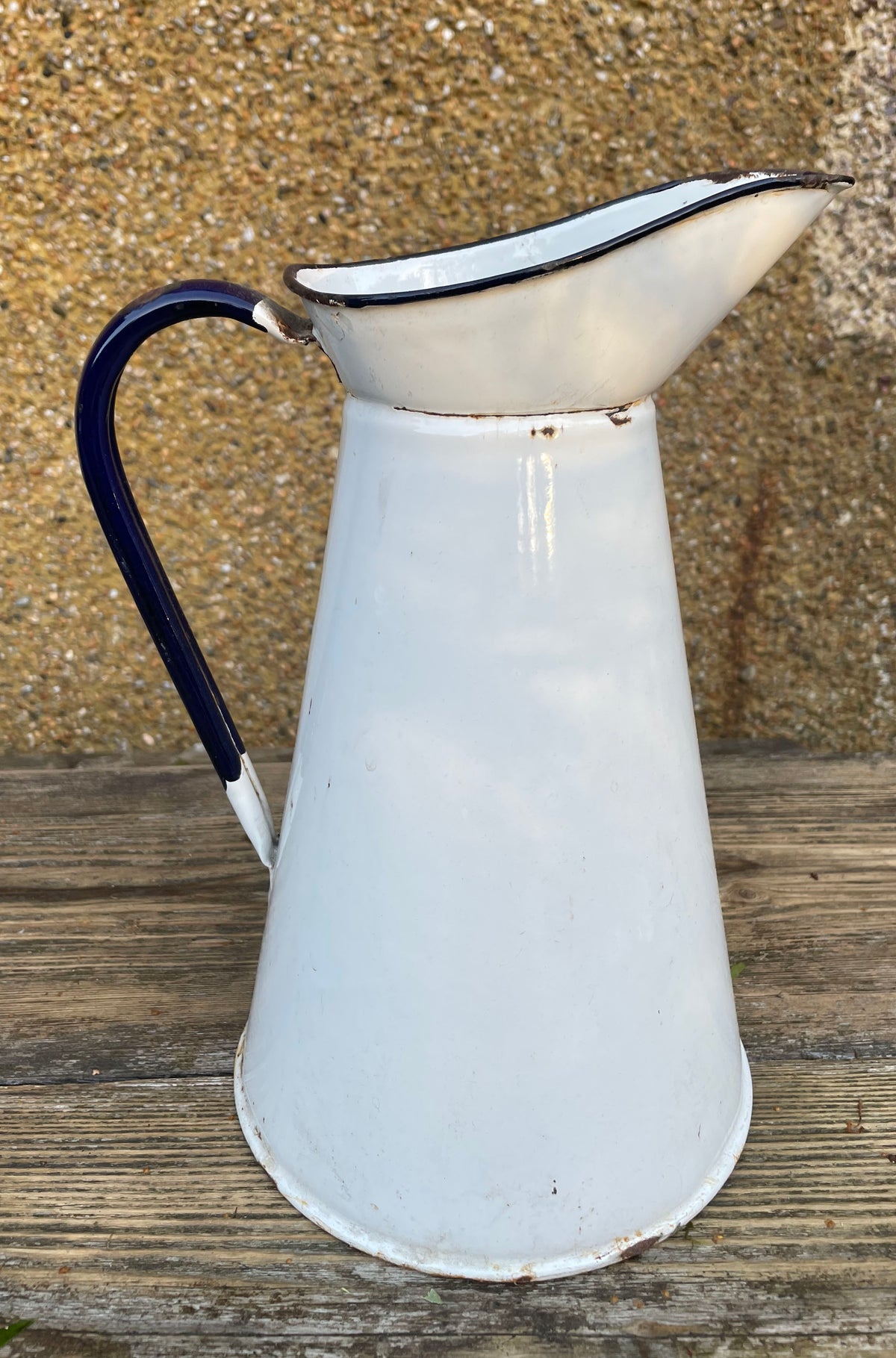 Vintage blue and white enamel jug.
