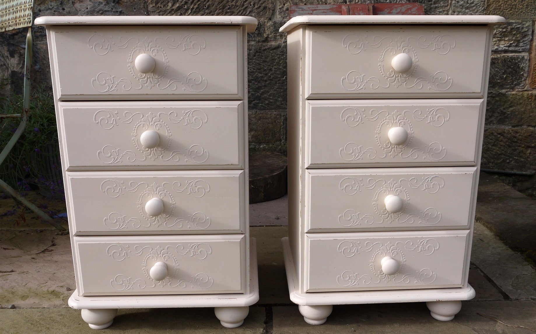 2 bedside tables with embossed drawer stencil