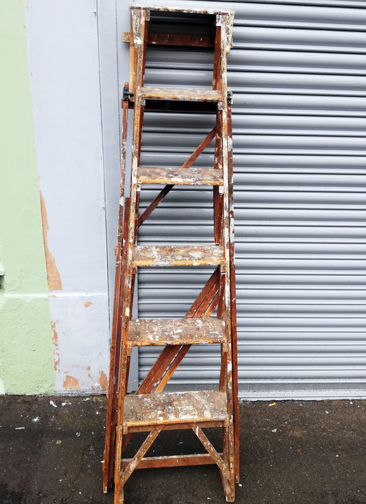 Beautiful paint splattered vintage set of ladders 