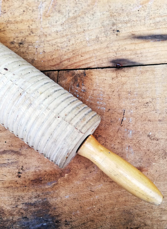 Beautiful vintage striped patterned rolling pin
