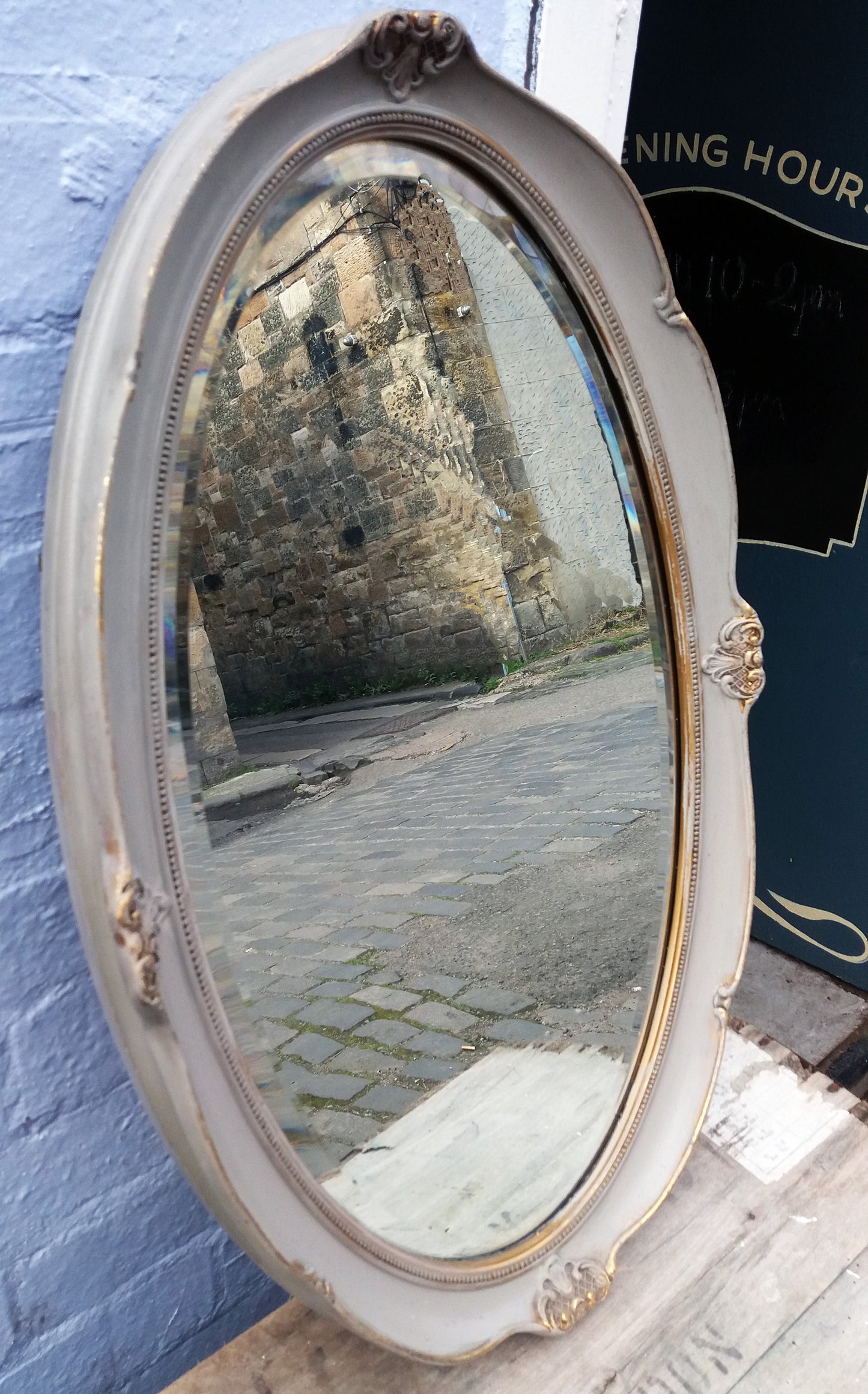 Gorgeous Vintage oval gilt mirror painted in miss mustard seed milk paint schloss. 63cm x 34cm. Original chain ready to hang