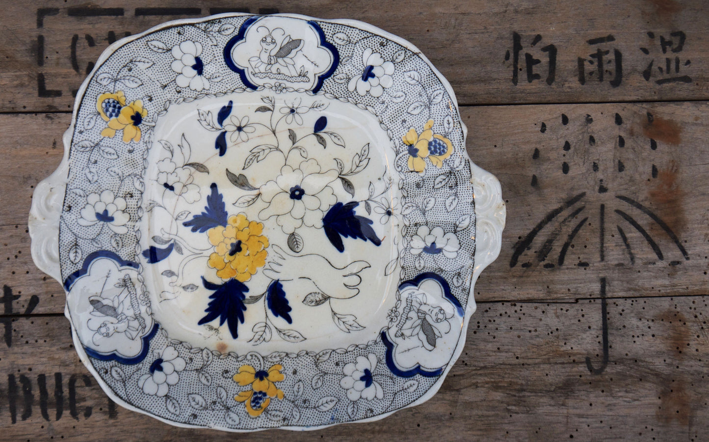 Gorgeous vintage blue and yellow cake plate. Some age related marks, crazing and hairline crack but the plate is still solid and beautiful!
