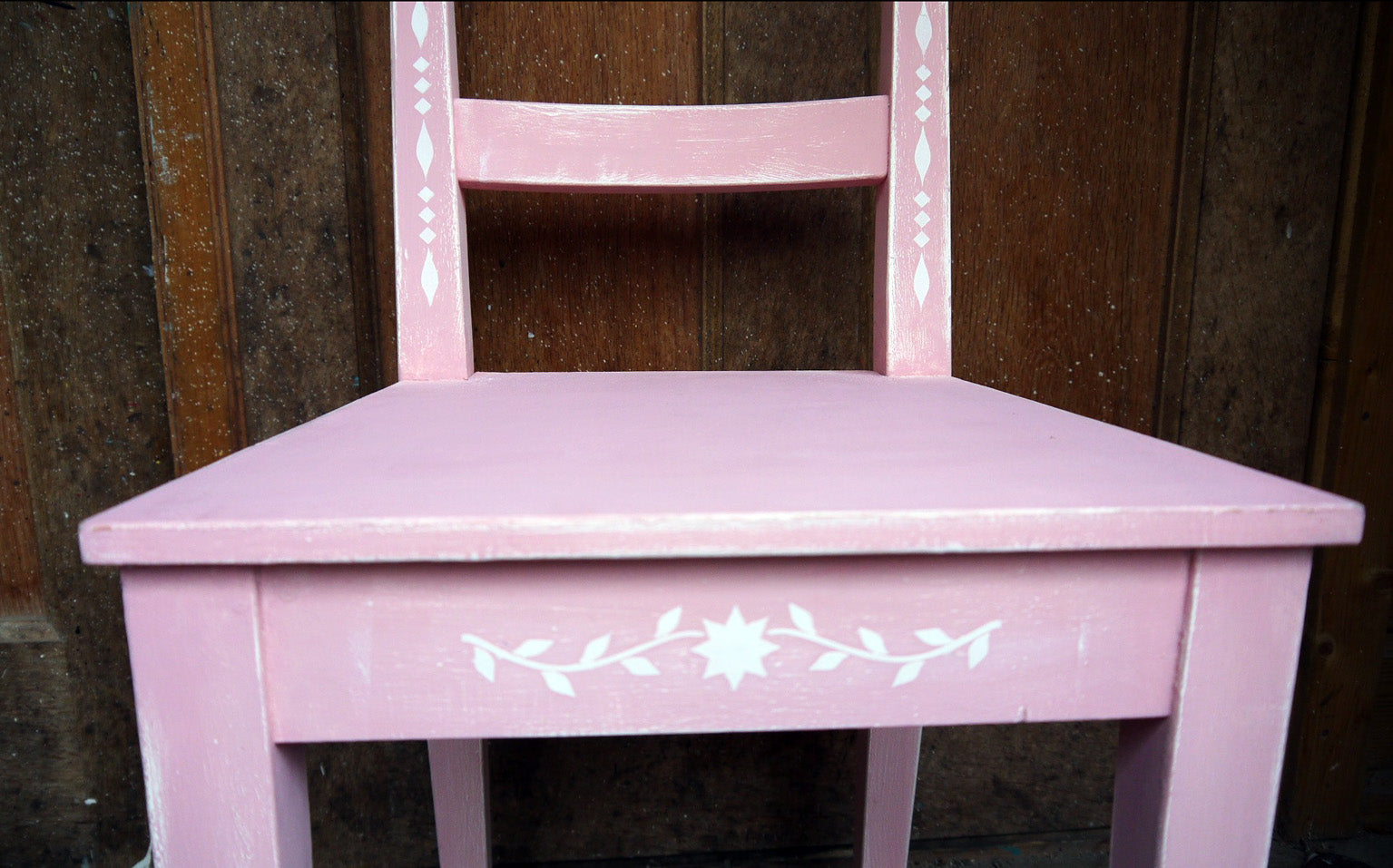 IKEA chair update painted in white and pik with bautiful folk art white stencil design - all profits got to Maggies Cancer Centres in aid of Breast Cancer Awarness Month
