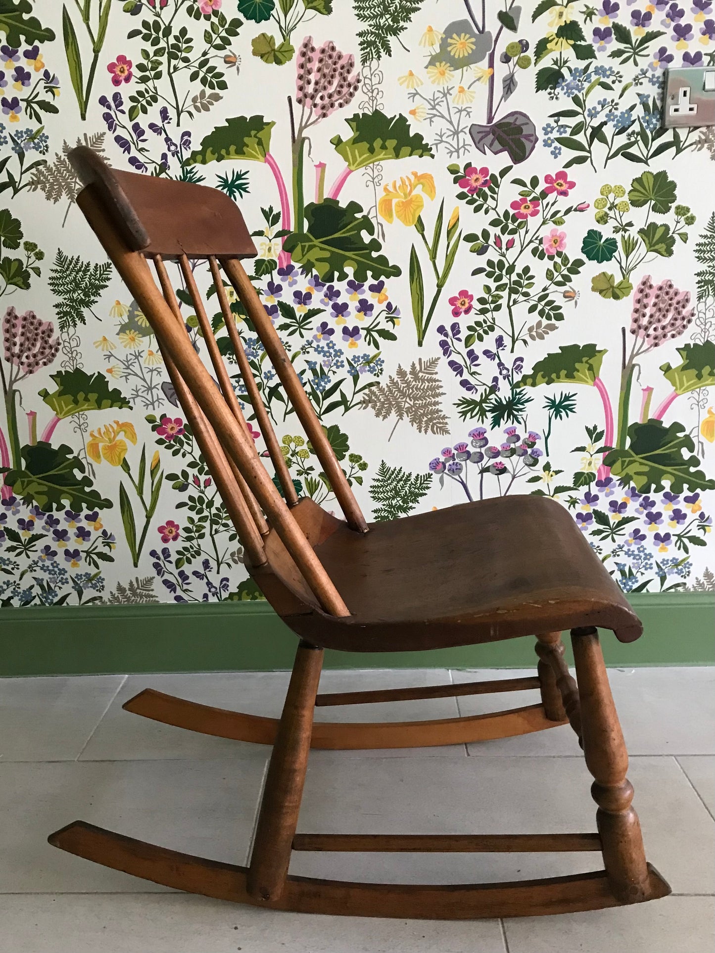 Vintage small wooden rocking chair