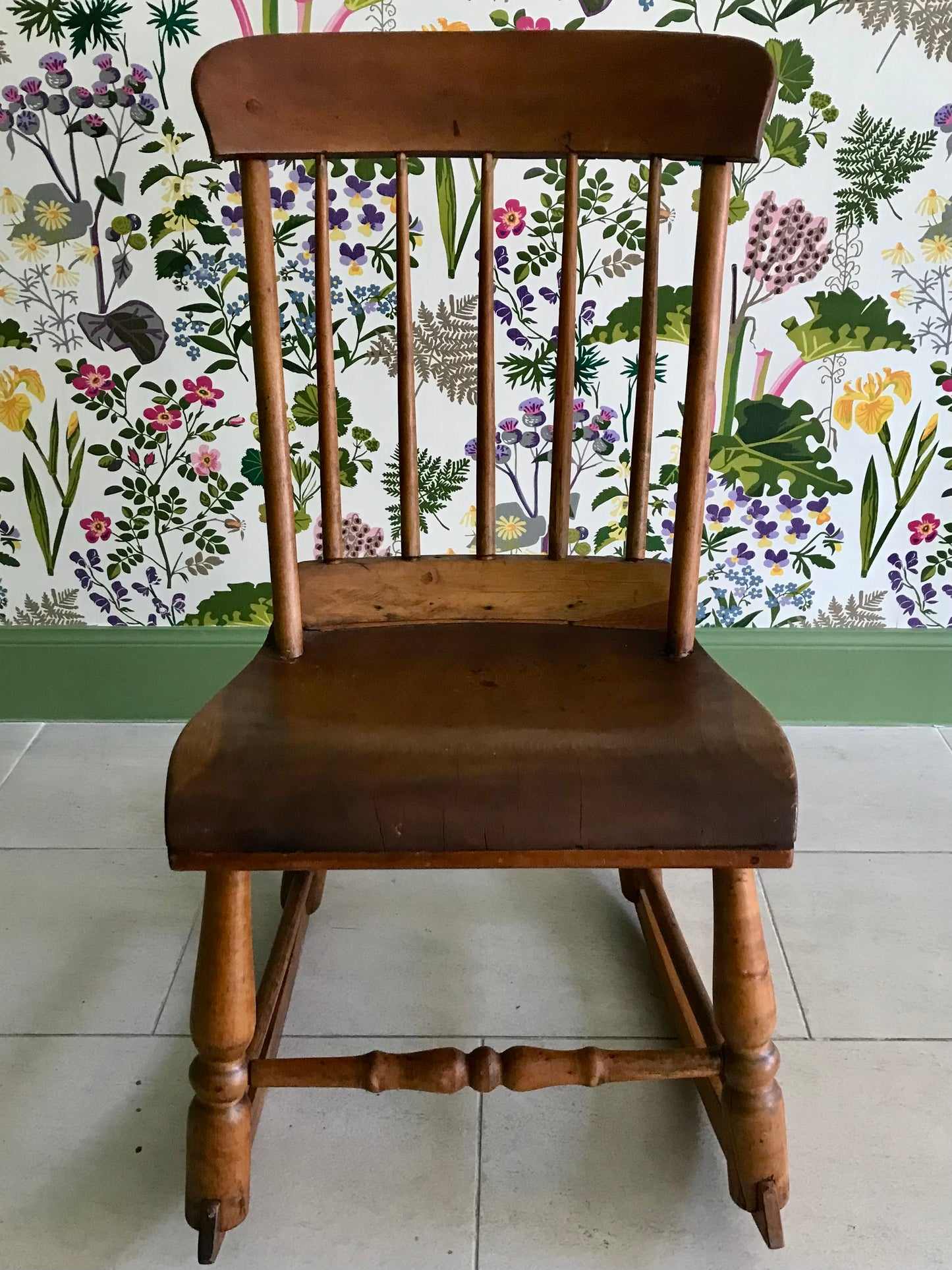 Vintage small wooden rocking chair