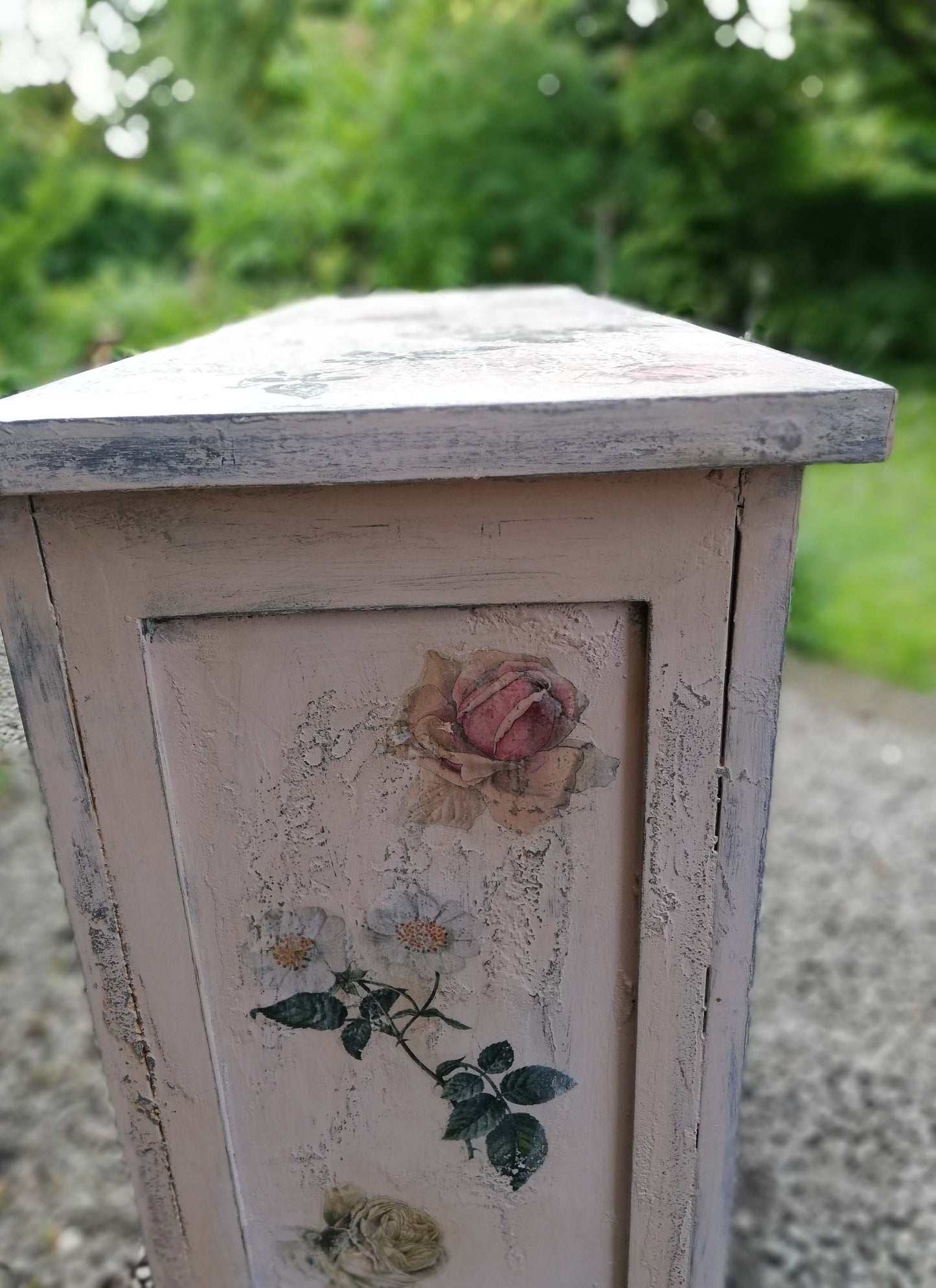 Boho pink painted bookcase with rose theme