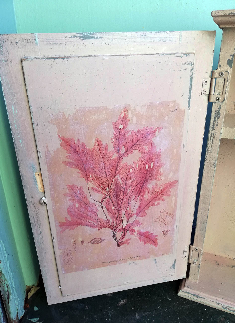 Vintage bathroom cabinet painted in soft pink
