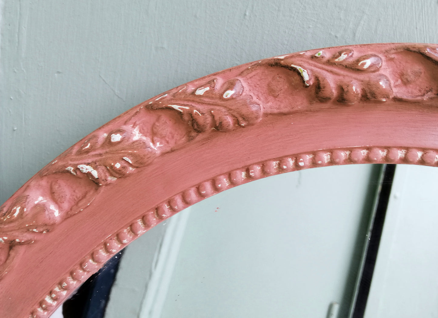 Ornate vintage mirror frame painted in Scandinavian Pink by Annie Sloan