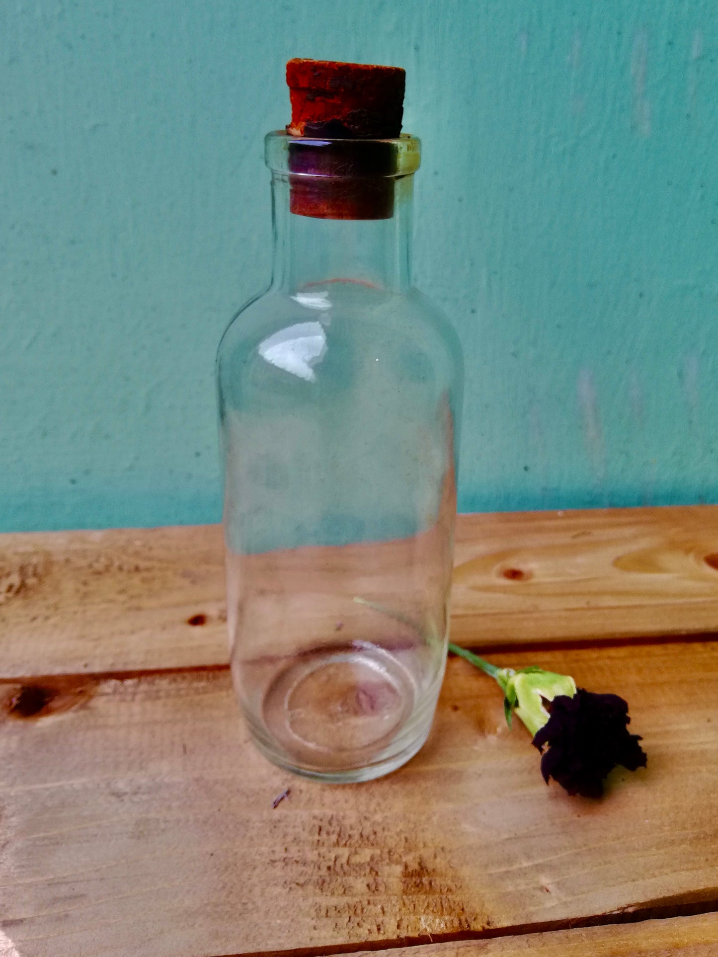 Vintage glass bottle with original stopper