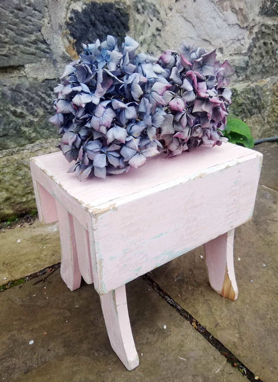 Reserved cute little vintage step stool in original chippy turquoise and pink paint