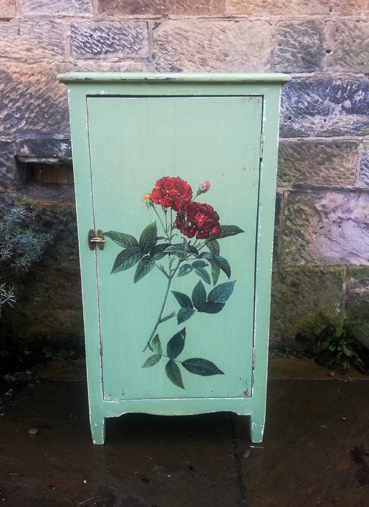 Cabinet painted in layers of Miss Mustard Seed Milk Paint with vintage rose design