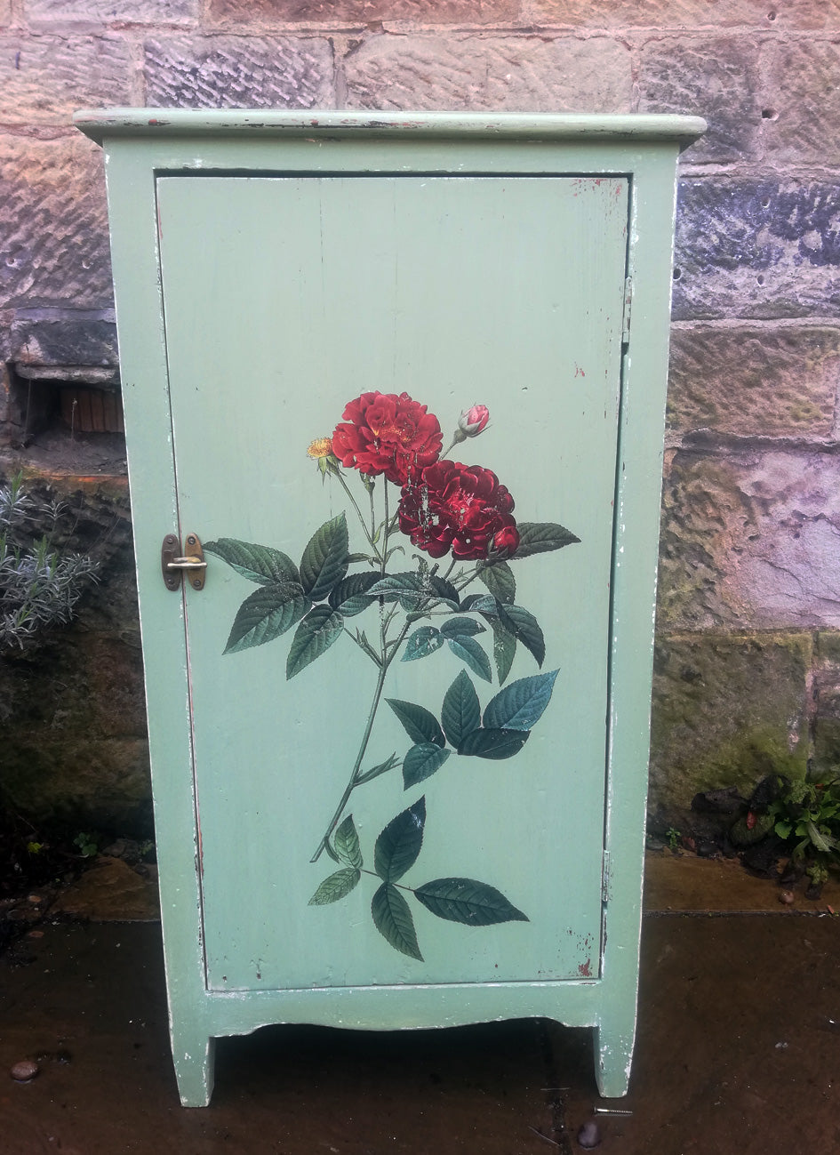 Cabinet painted in layers of Miss Mustard Seed Milk Paint with vintage rose design