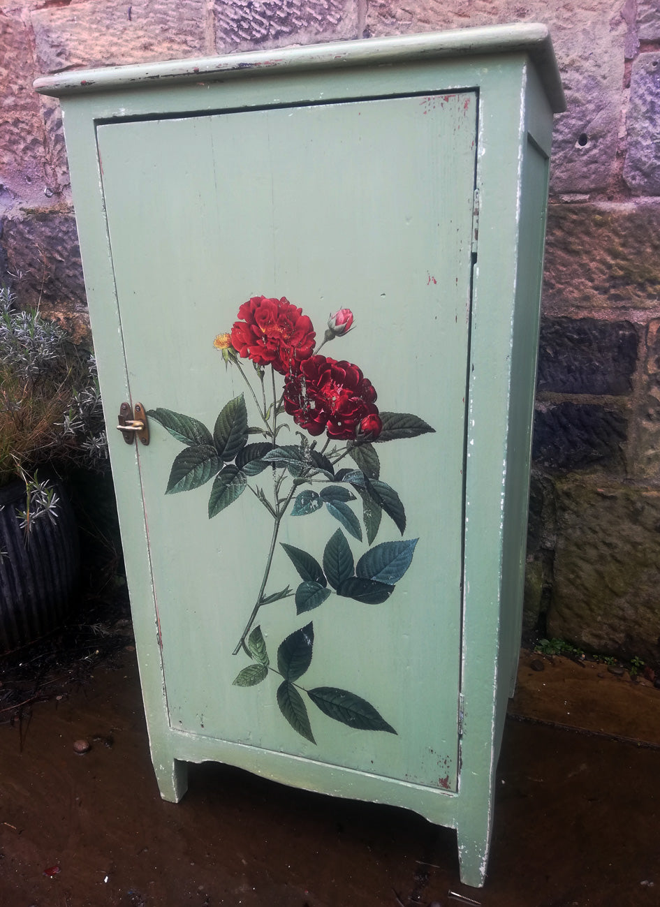 Cabinet painted in layers of Miss Mustard Seed Milk Paint with vintage rose design