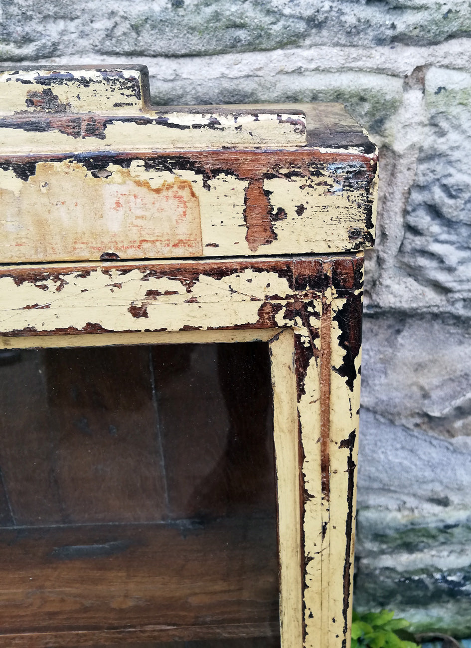 Beautiful antique teak painted glass fronted wall cabinet with original golden yellow chippy paint