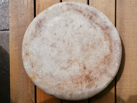 Antique stone chapati board. These make prefect trivets, pot stands or cheese boards