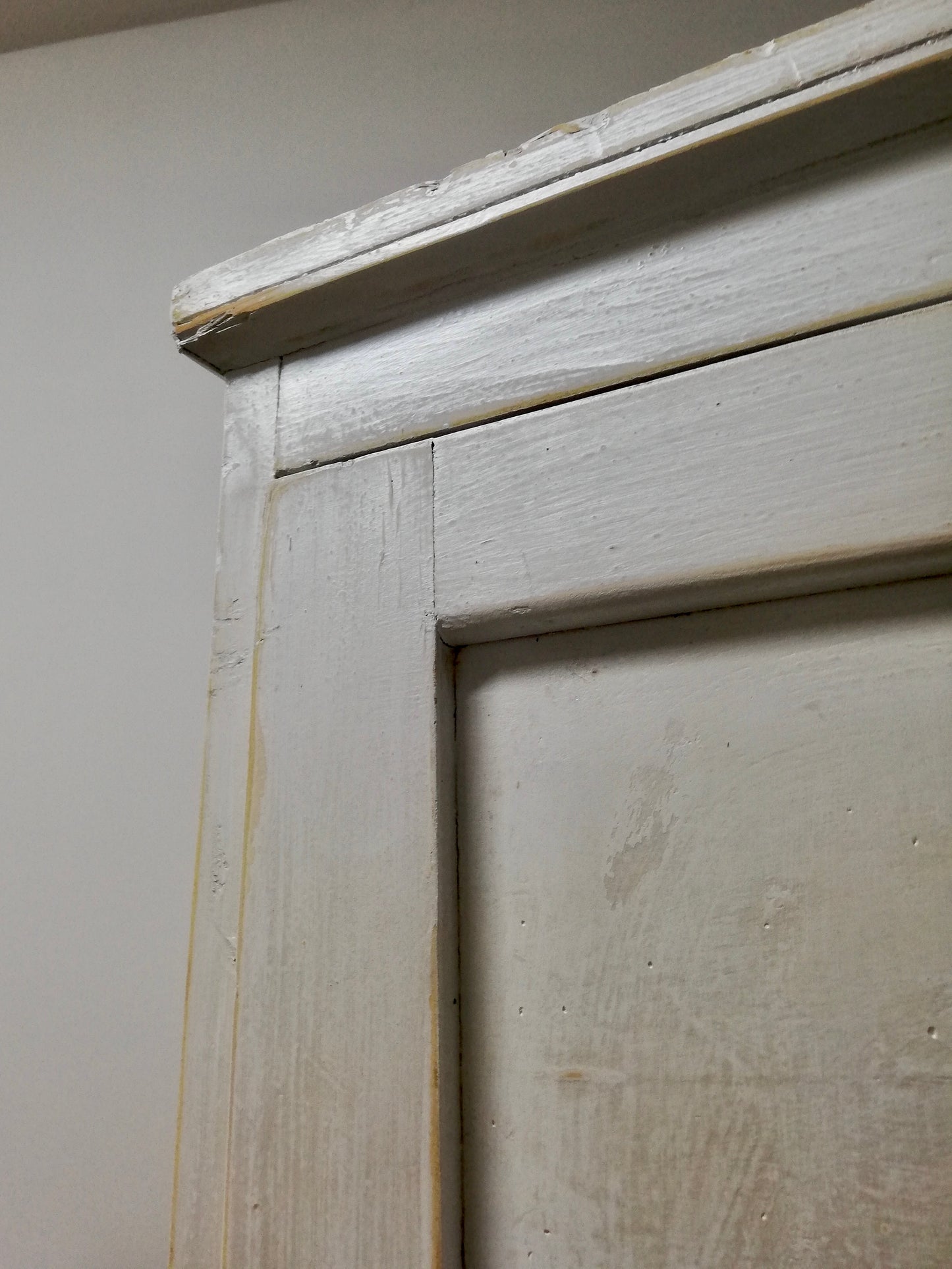 Vintage pantry cupboard painted in casement white and pearl metallic