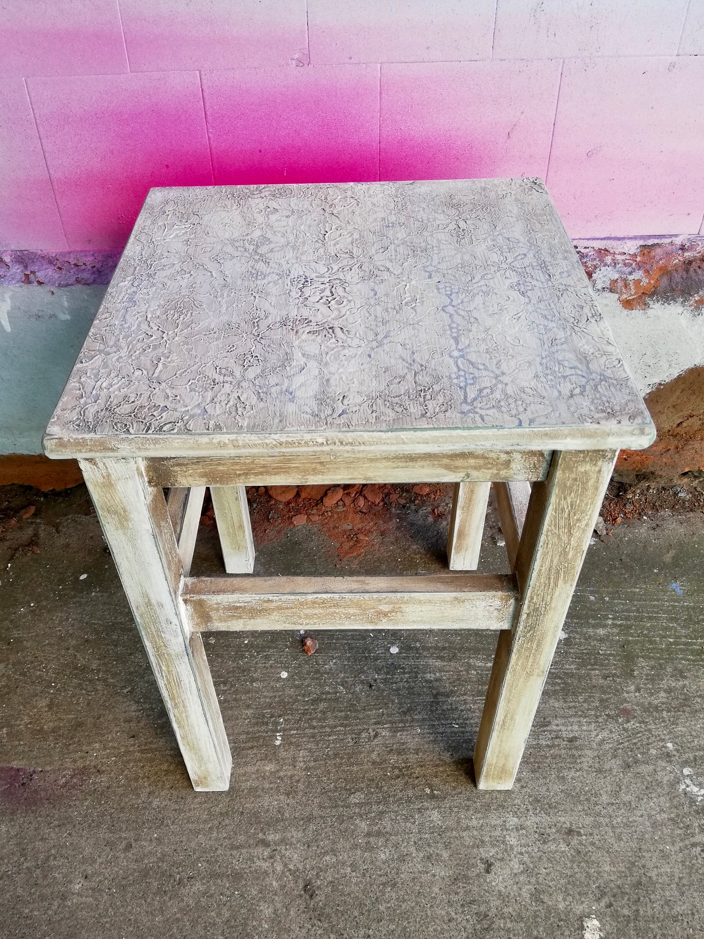Painted and embossed side table / stool