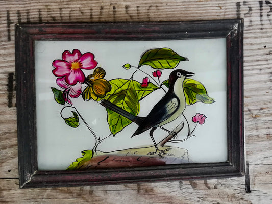 Vintage glass painting of a bird in a beautiful original frame