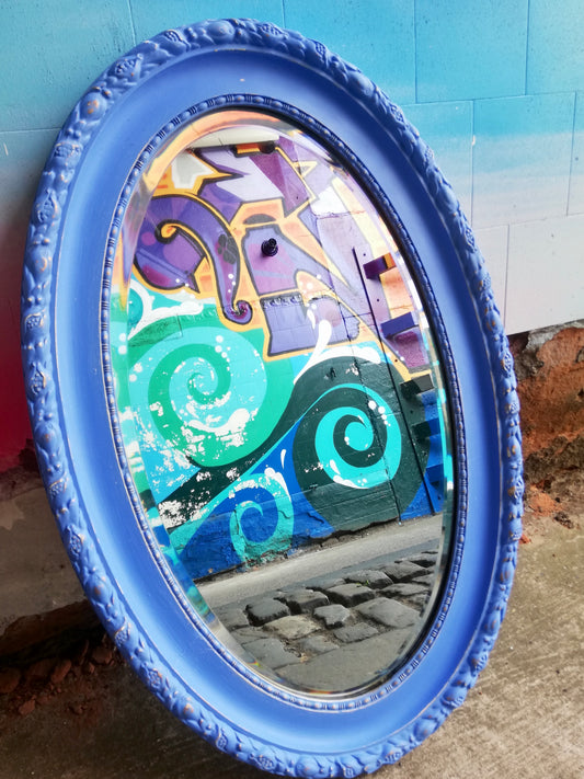 Chunky ornate oval mirror painted in an Harmony Paint Santorini