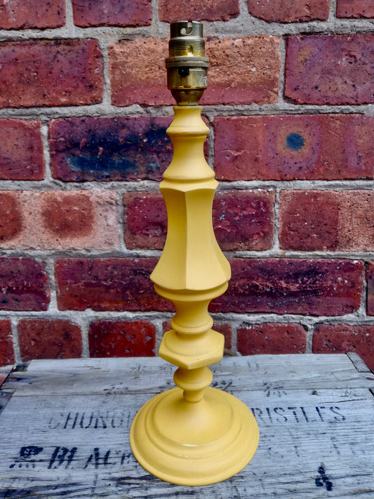 Vintage lamp base painted a sunny yellow