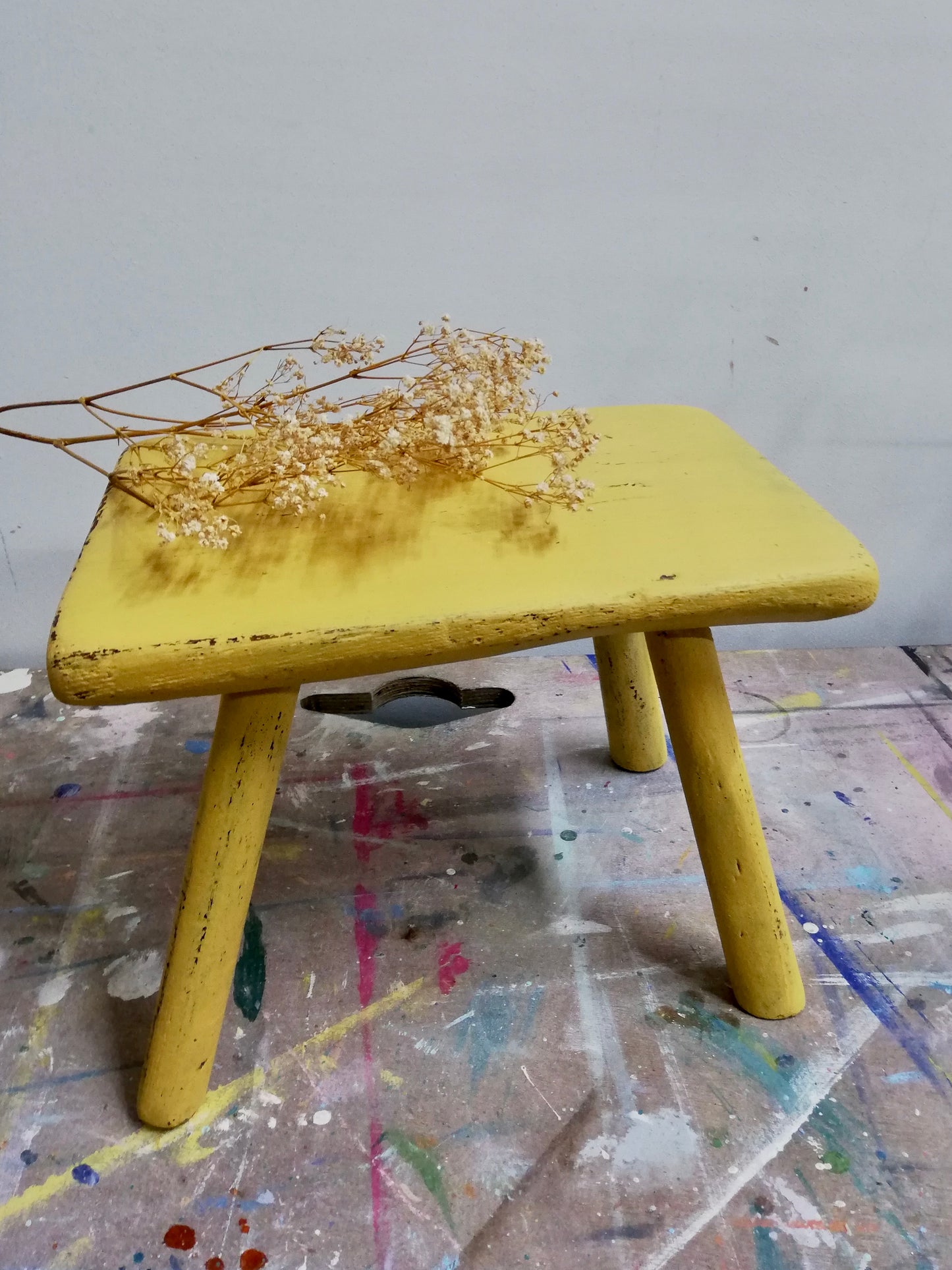 Cute little primitive step stool in yellow