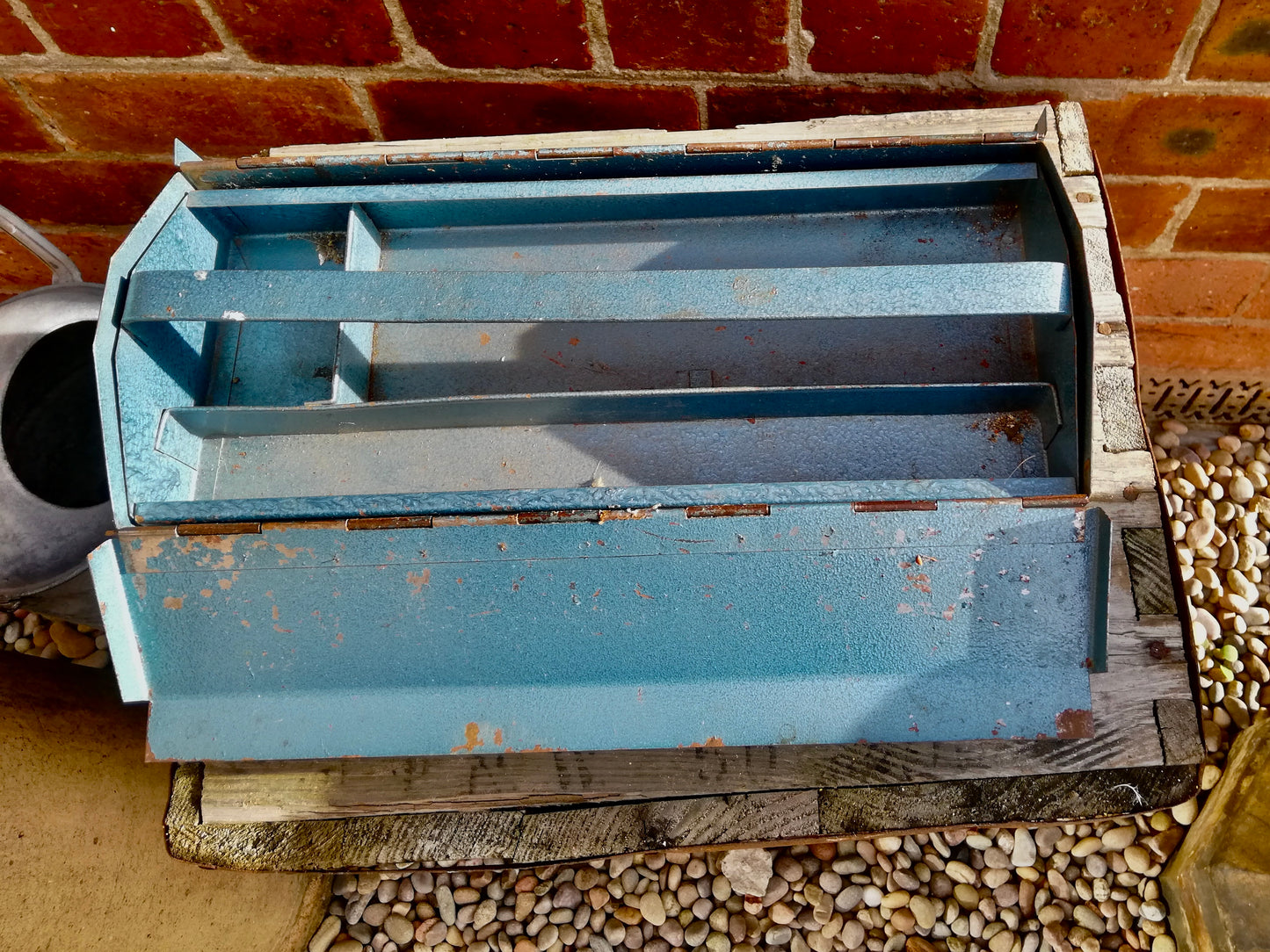 Vintage blue metal tool box with hammer design