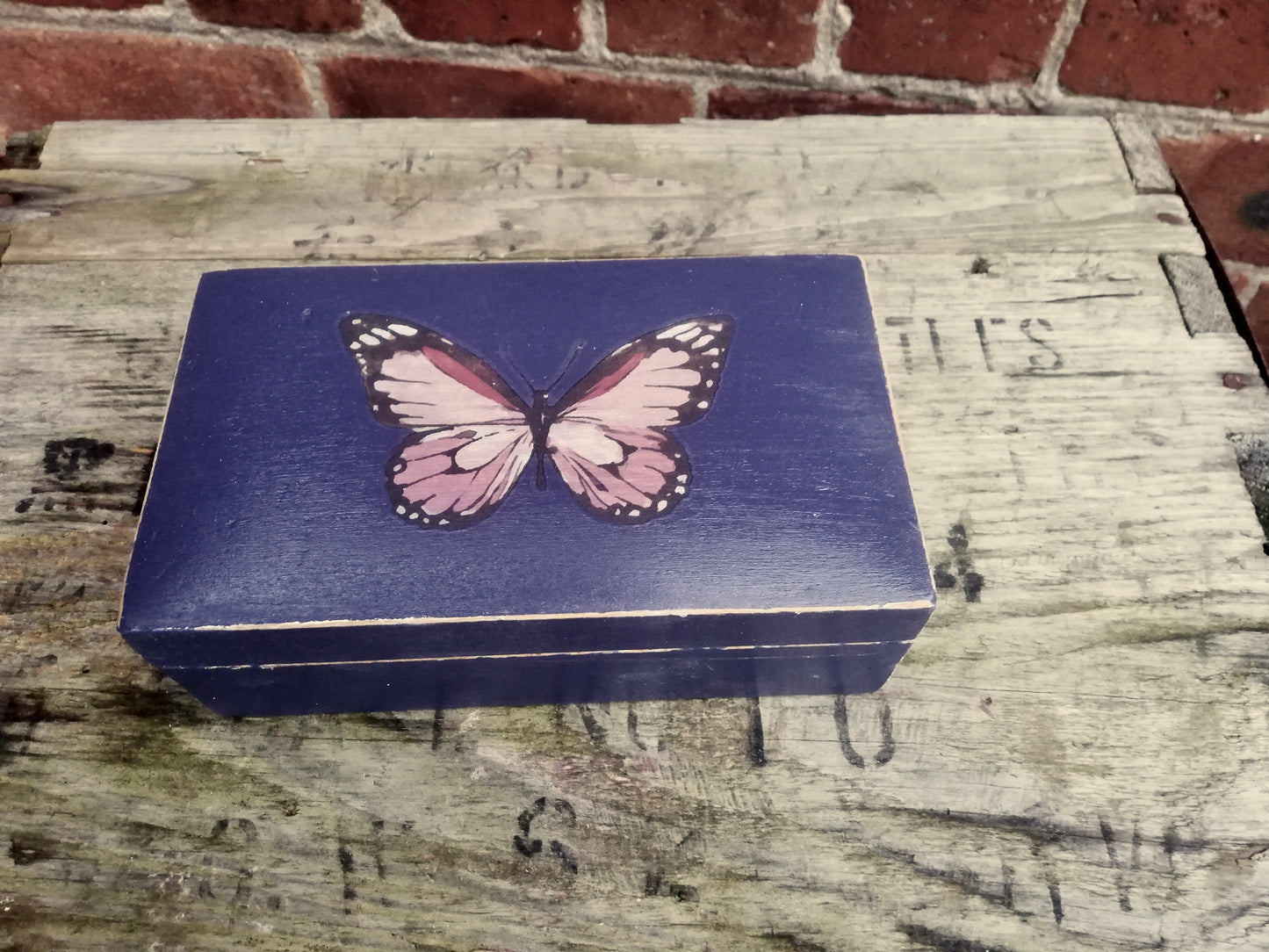 Vintage wooden box with butterfly design