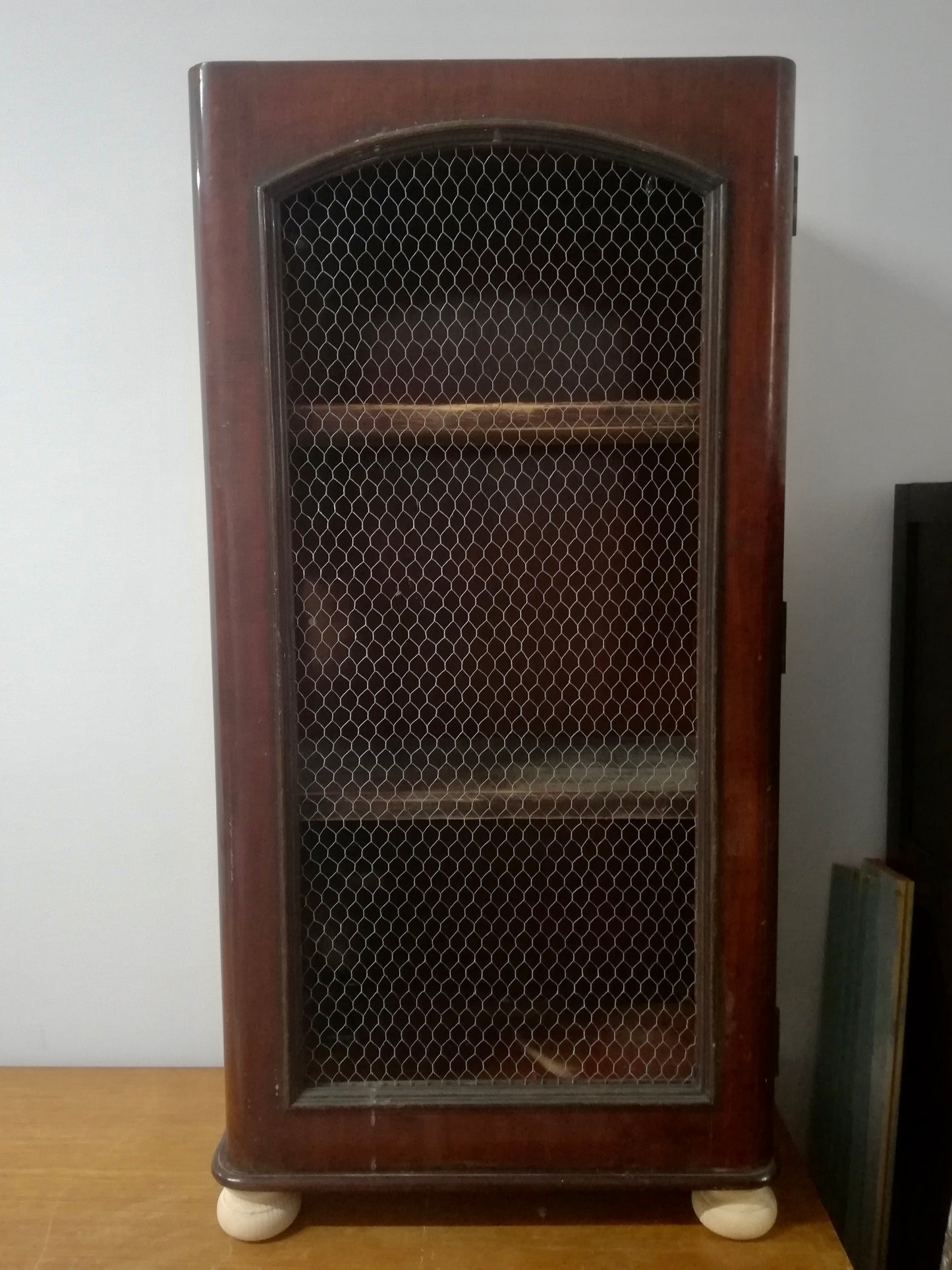 Vintage chicken wire cabinet available;able for painting