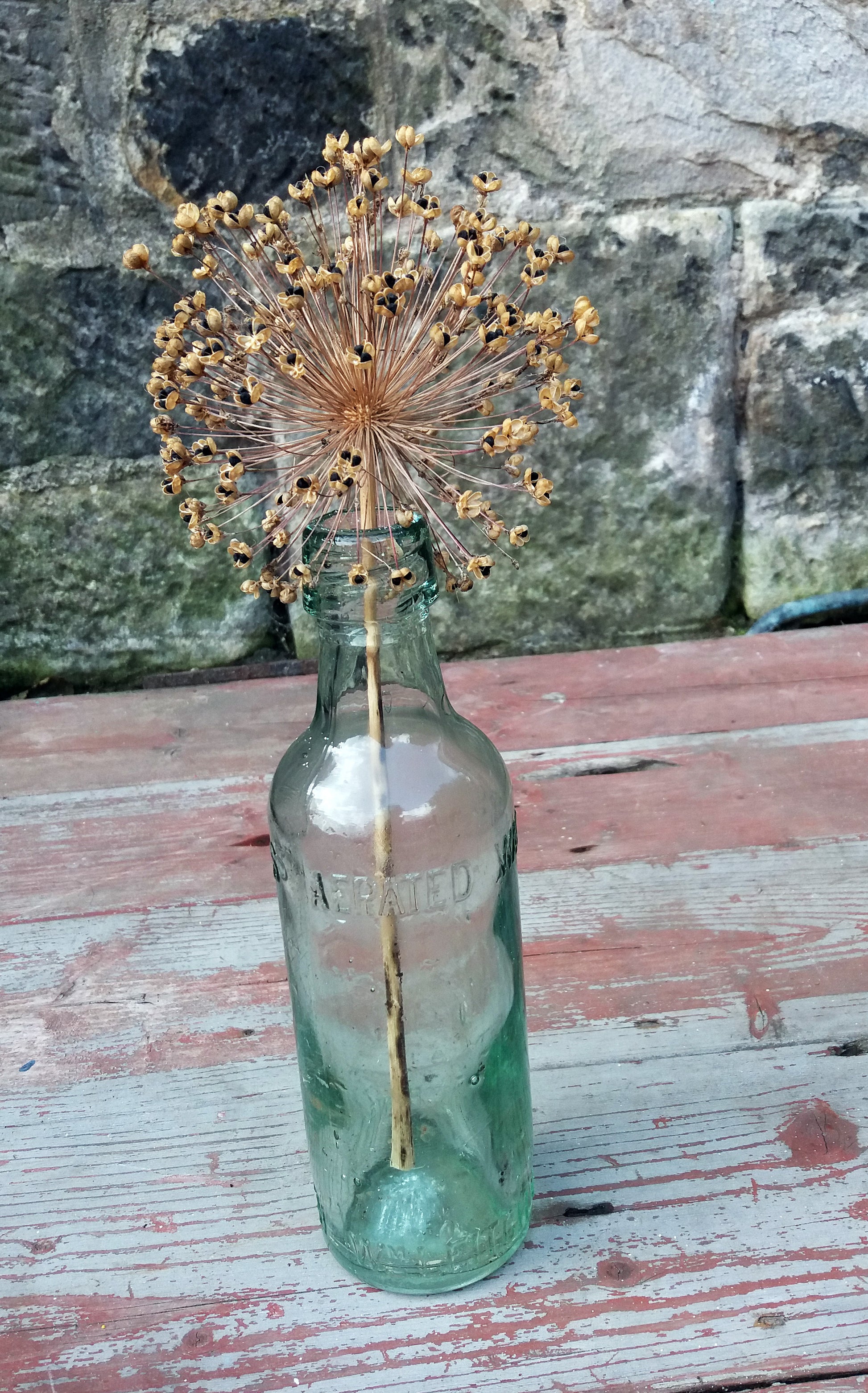 Large vintage glass bottle.