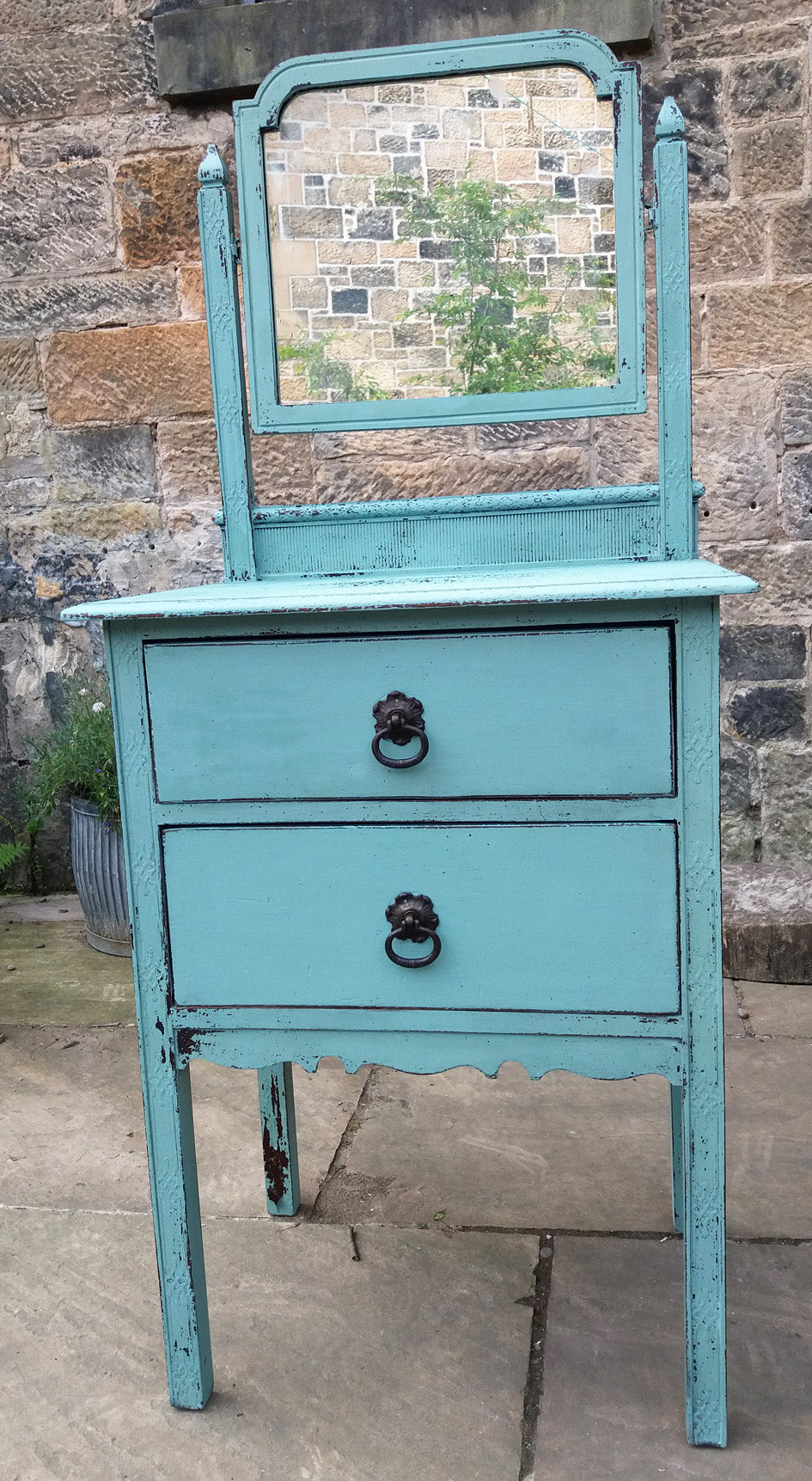 Little carved vintage dressing table painted in chippy milk paint in robin's egg blue.