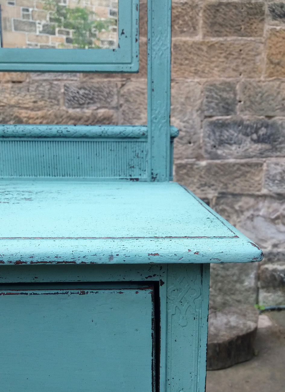 Little carved vintage dressing table painted in chippy milk paint in robin's egg blue.