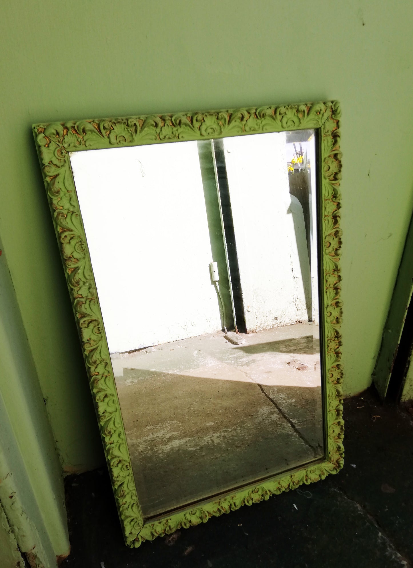 Ornate gold mirror painted in a Pistachio  Green antique finish