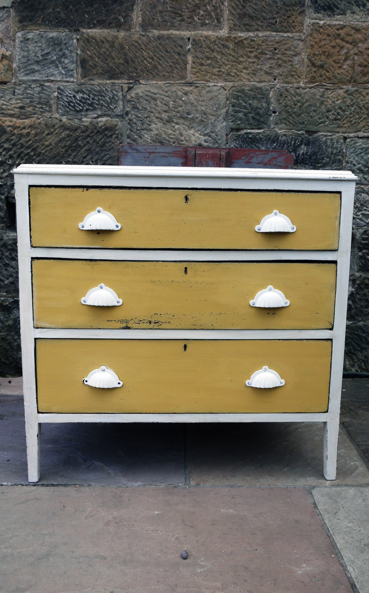 Refurbished vintage chest of drawers in Miss Mustard Seed Milk Paint with white handles