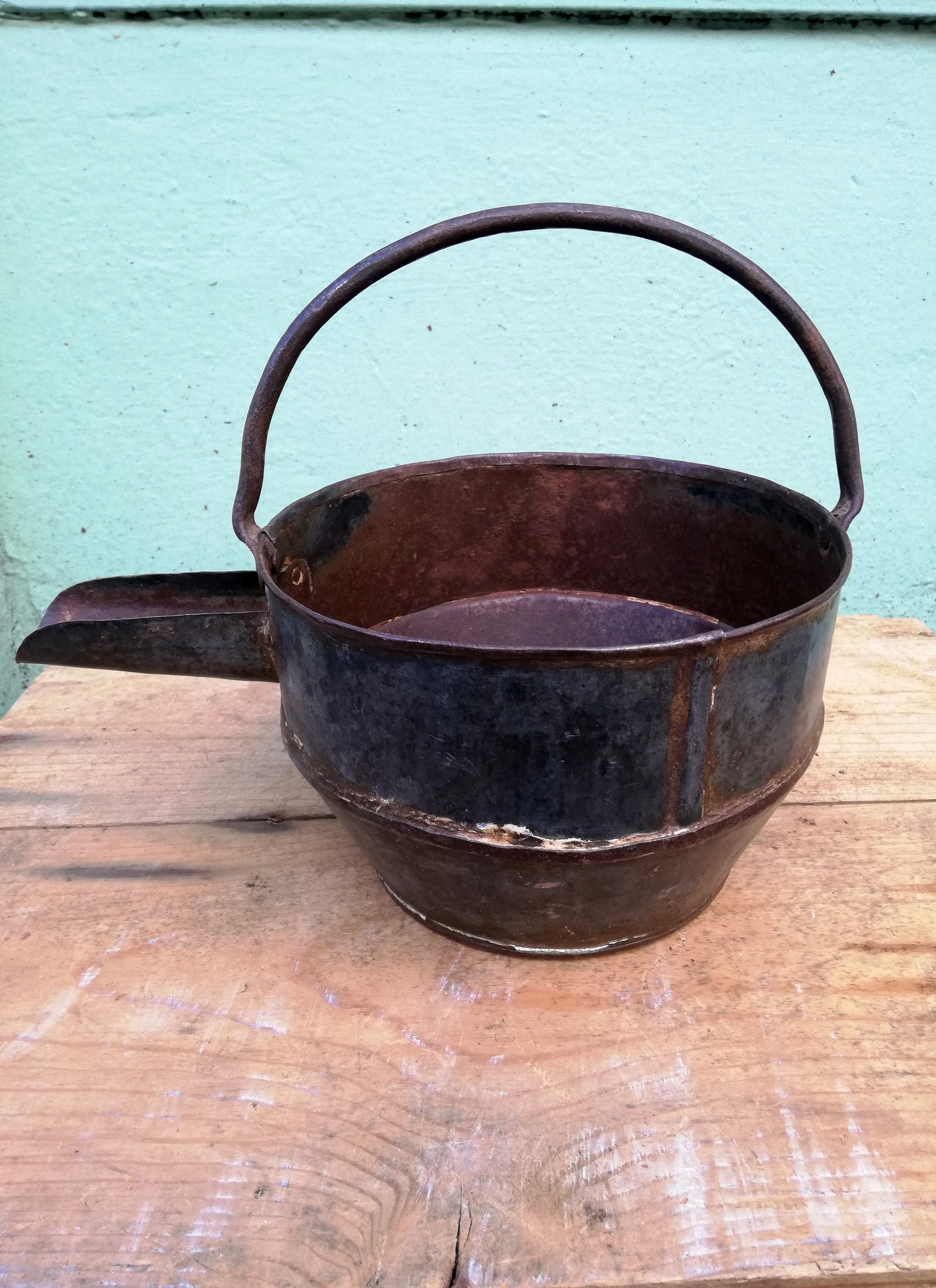 Restored antique iron curd pots. 