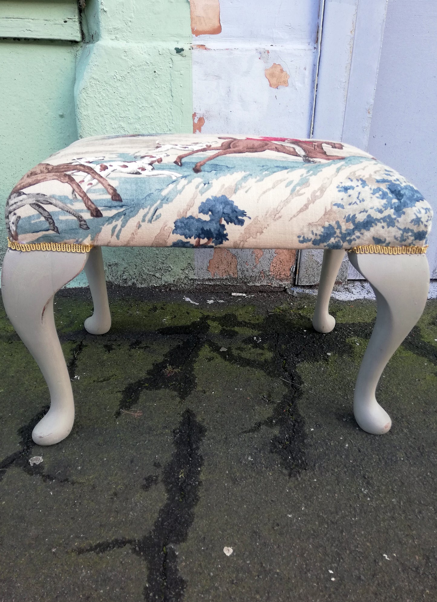 Stunning refurbished footstool in Linwood hunting fabric.