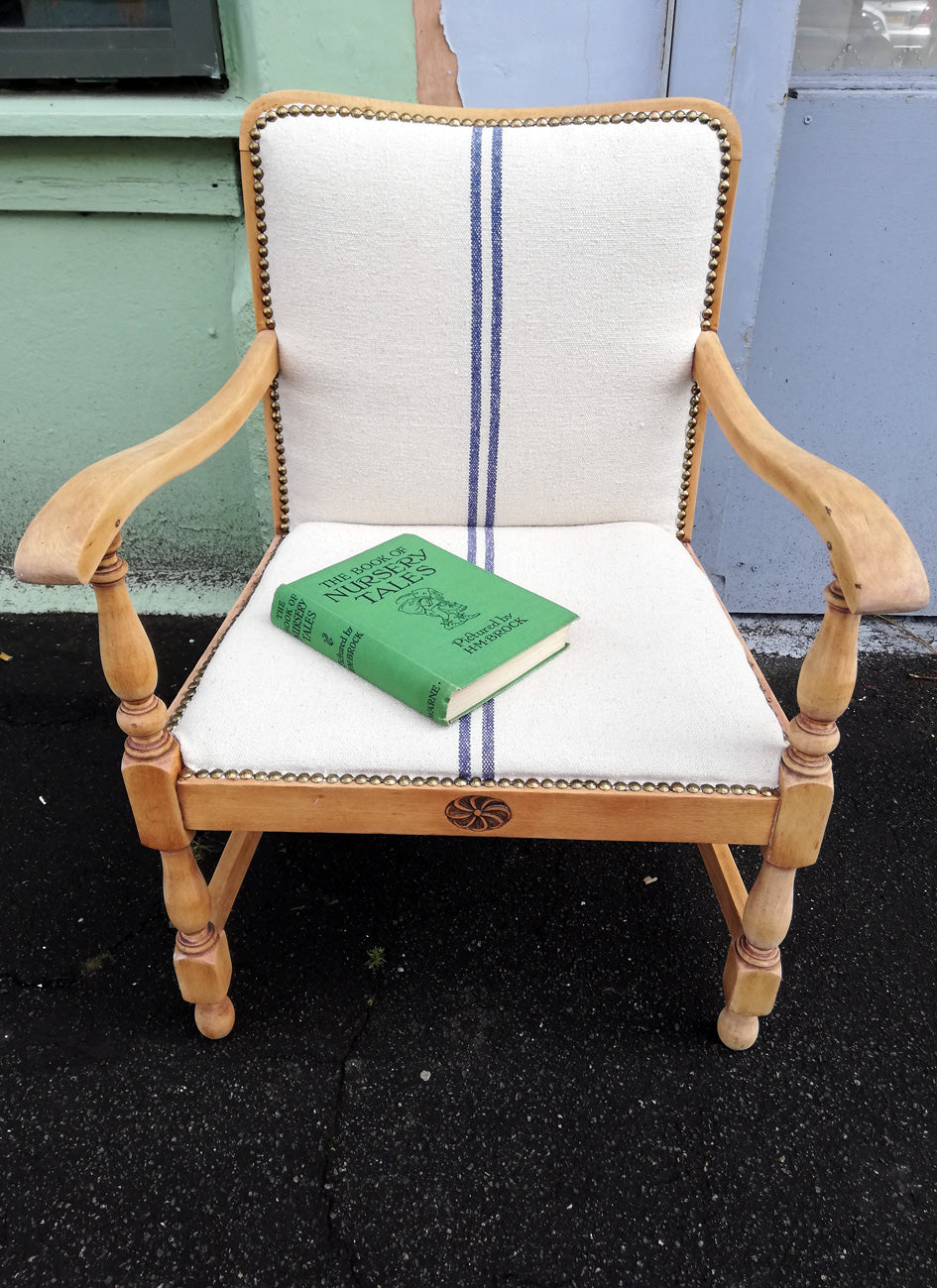 Super cute upholstered vintage children's arm chair.