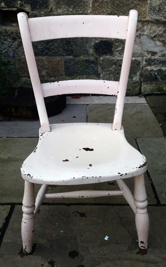 Super cute vintage children's chair in its original pink chippy paintwork