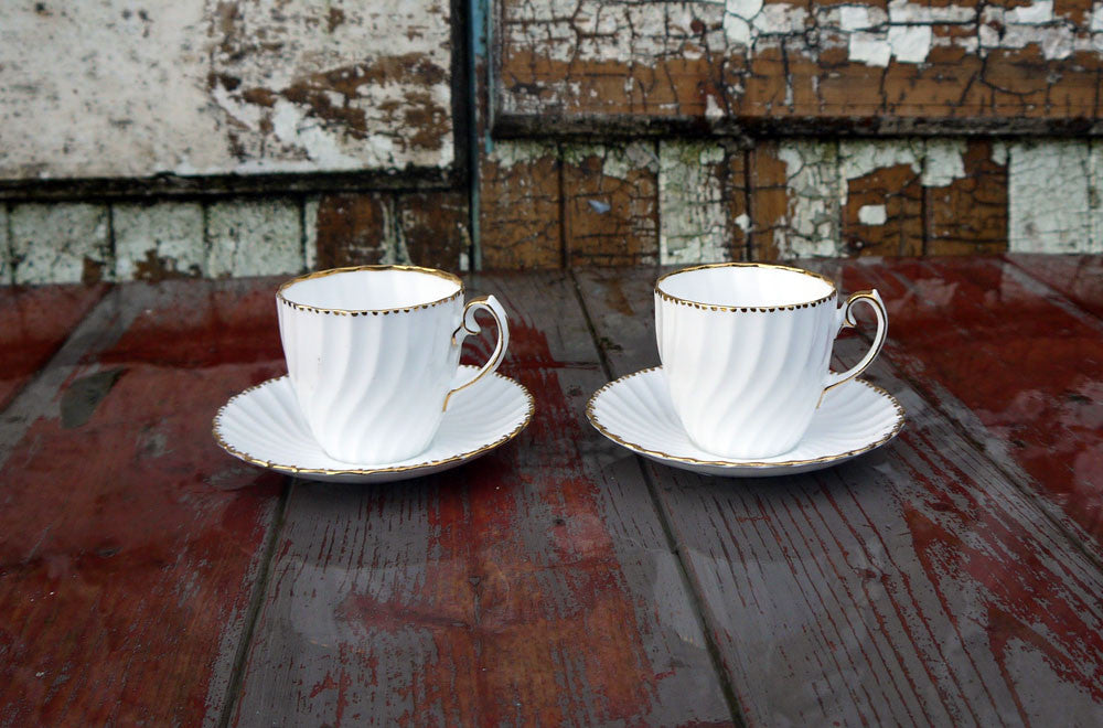 Tea for Two  fluted white and gold vintage teacups and saucers