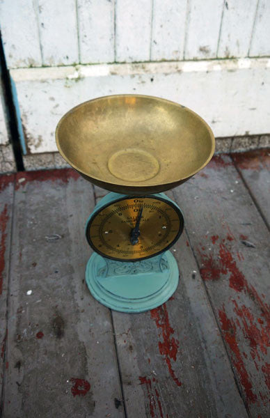 Vintage brass tone weighing scales with the base painted in Miss Mustard Seed Milk Paint and sealed with wax