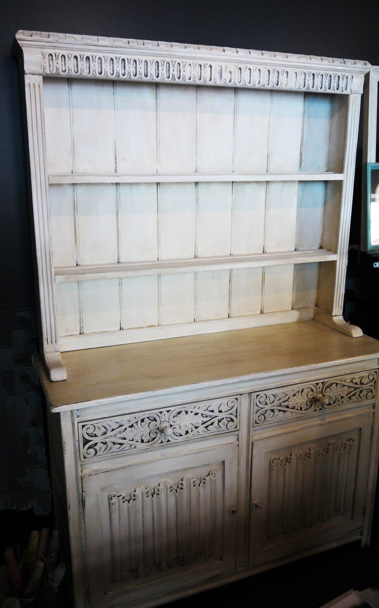 Vintage carved oak kitchen dresser painted in a soft cream and distressed and antique glazed for a vintage finish
