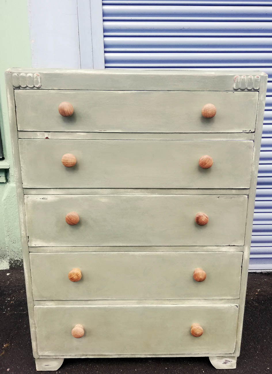 Vintage chest of drawers hand painted in layers of chippy chalk paint in cream and soft green