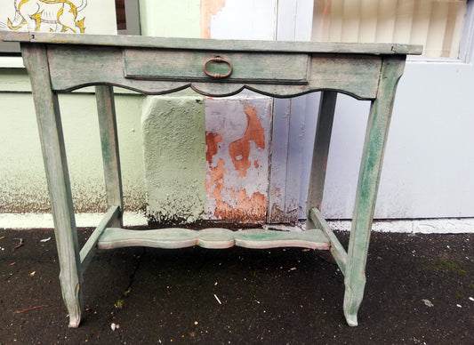 Vintage console table / desk painted in soft layers of green, coral and cream