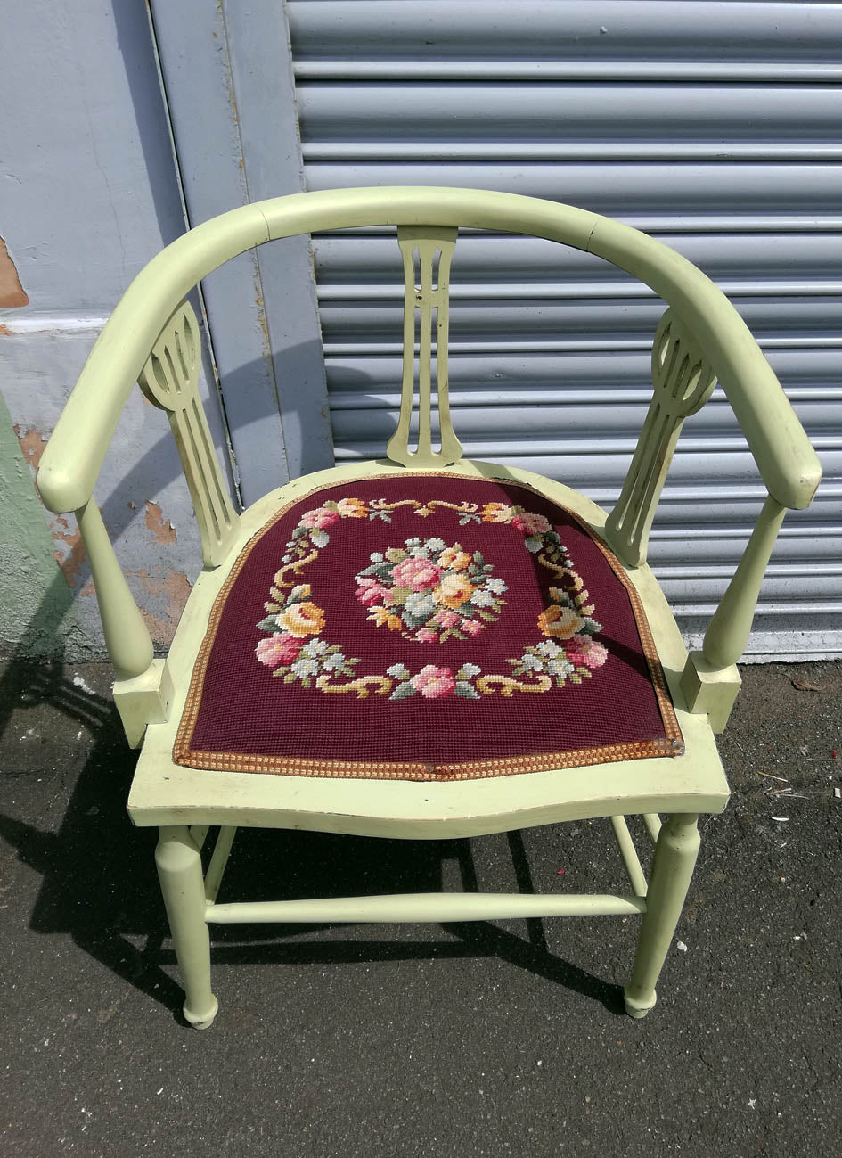 Vintage needlepoint bedroom chair painted in a soft apple green