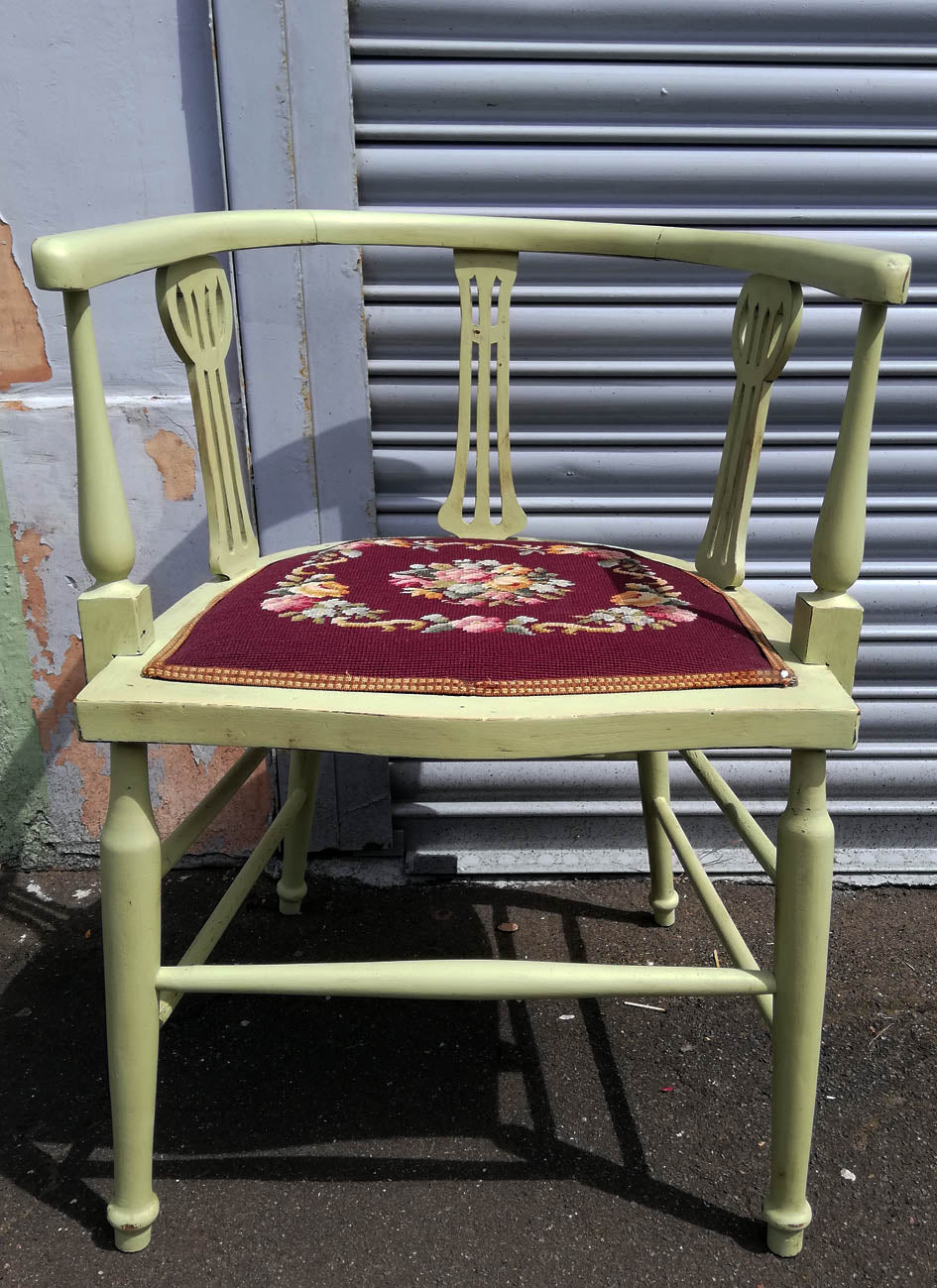 Vintage needlepoint bedroom chair painted in a soft apple green