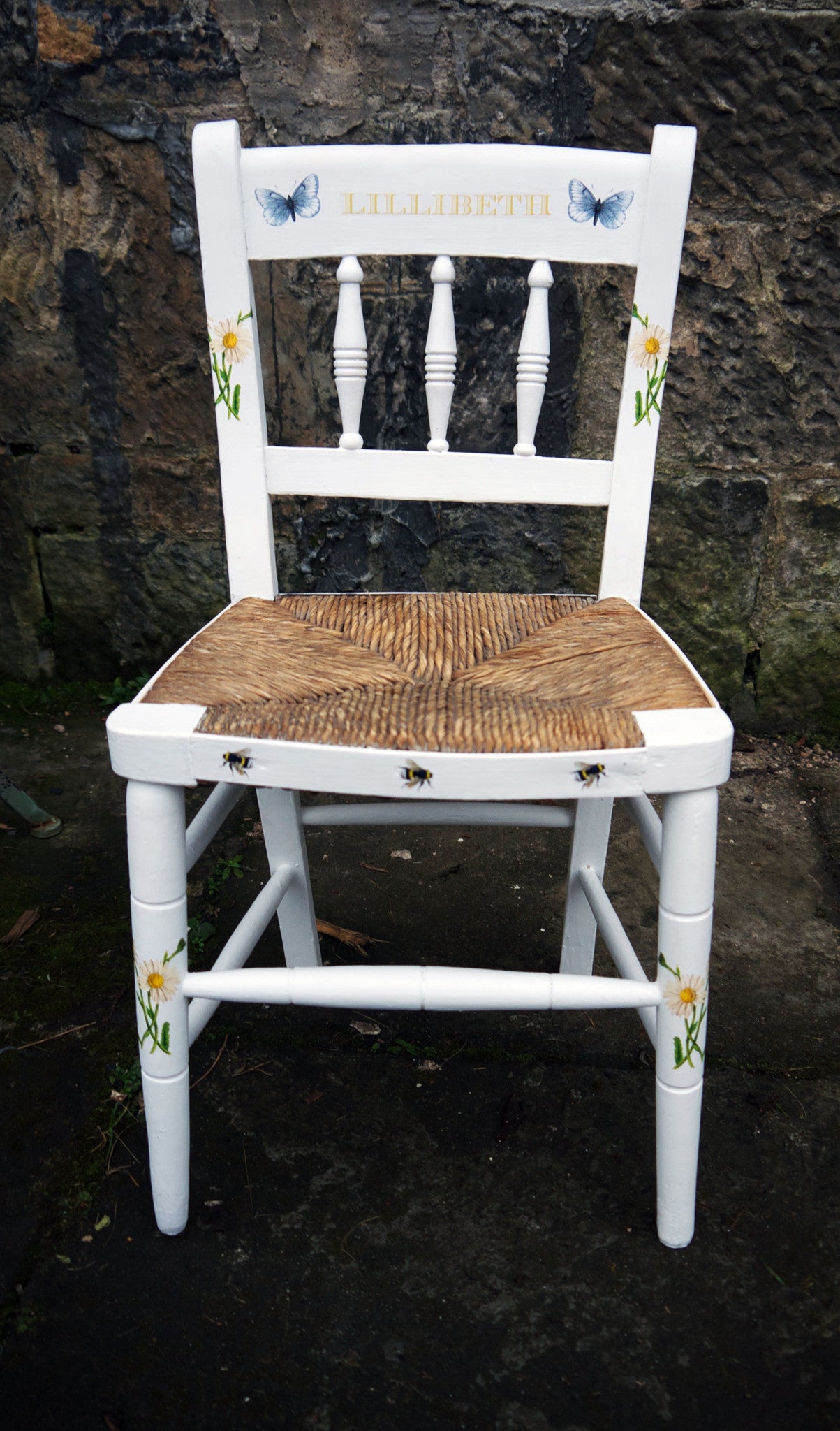 Vintage personalised children's rush seat chair with bees and butterfly design