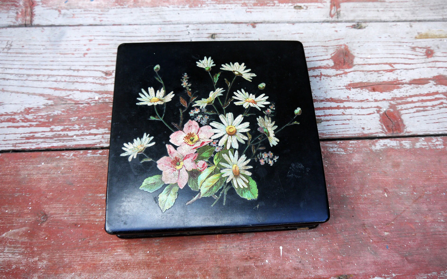 Vintage square floral wooden box in black and red wth traditional decoupaged flowers on the lid