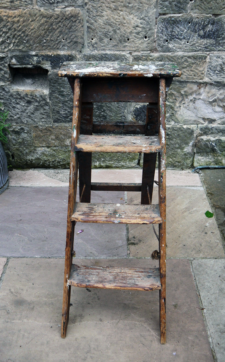 Vintage wooden paint splattered step ladder