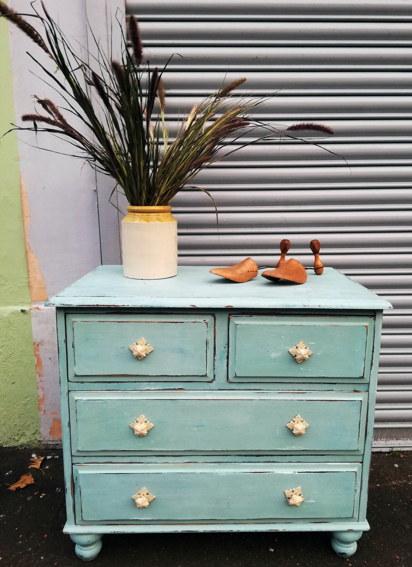 Vintage chest of drawers painted in chippy soft blue milk paint